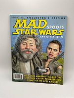 Front cover of the special collector's edition MAD magazine spoofing Star Wars and sci-fi movies, featuring caricatured characters and colorful text.