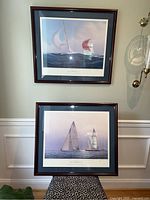 Both framed prints hung on wall, showing overall lot