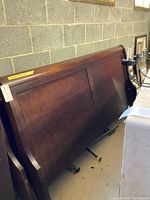 Sleigh bed headboard panel with curved top and inset panel