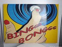 Front view of one panel showing colorful thumb pressing button graphic and the phrase 'Binggg Bonggg' in red letters on yellow background