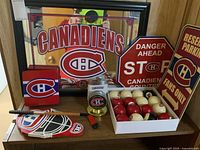 Full lot including framed mirror, pool balls, metal signs, metal box, flask, and collectibles.