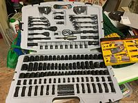 Top half of Stanley Fatmax mechanic tool set showing ratchets, wrenches, hex keys, screwdriver handle, and some sockets.