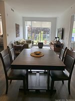 Dining table and chairs set in room