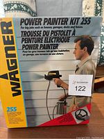 Front view of the Wagner Power Painter Kit 255 box showing the product branding and intended large-scale applications such as houses and decks.