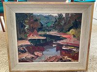 Full frontal view of the painting in its wood frame