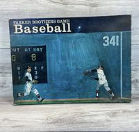 The front of the original game box showing vintage baseball player artwork and game title.