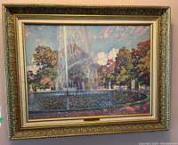 Full view of the framed textured print showing the fountain scene with water and trees in autumn colors.