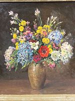 Close-up of Robert Burns Wilson signed painting showing colorful still life of flowers in a vase.