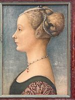 Close-up of print showing profile of young woman with intricate hairstyle and pearl accessories.