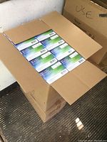 Open case showing 10 boxes of Microflex Ultraform nitrile gloves in size Large inside a cardboard box.