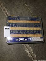 Closed case showing Mastercraft Maximum brand and 40 pieces indication with some router bit profiles illustrated on wooden slats inside.