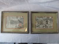 Two framed and matted art prints by Anton Franciscus Pieck, titled "Steam Trolley" and "The Toy Shop", shown side by side.