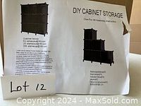 Photo of the instruction sheet showing the modular cubes in different configurations, with assembly instructions and customer service contact.