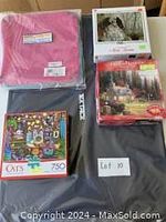 The overall lot image showing the pink puzzle board, the black puzzle mat, and the three puzzle boxes featuring the different puzzles included.