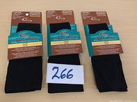 Three packs of Copper Sole compression socks stacked horizontally, black color, labeled 266.