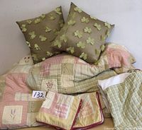 Full view of patchwork queen duvet cover, pillows with butterfly appliques, and matching bed skirt.