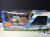 Packaged Honey Airborne Cyclone toy helicopter with box showing details of infrared transmission technology and product features