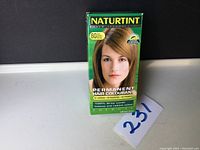 Front of the Naturtint 6G Dark Golden Blonde hair colour box showing the product name, image of woman with hair colour, and key product claims.