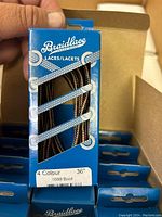 Box of new Braidlace 4 color shoe laces for boots, 36 inch length, showing product packaging and branding.
