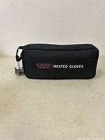 Zippered black case with Neberon logo and "Heated Gloves" text