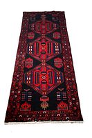 Full view of runner rug laid flat, showing entire length and overall geometric design.