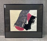 Full view of the framed collage artwork showing the overall composition and framing.