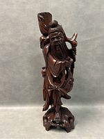 Front view of the 20-inch tall carved wooden statue depicting an Asian old man holding a staff, showing overall condition and craftsmanship.