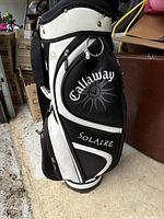 Photo of the Callaway Solaire golf bag showing side view with branding and compartments.
