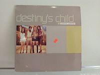Front cover of Destiny's Child Jumpin Jumpin two disc LP album with photo of band members and design elements.