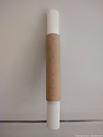 Front view of the rolling pin showing beech wood barrel and white melamine handle ends