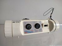 Front view showing controls, tuning dial, and flashlight window on the Sportle ma-838 vintage radio.