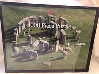Front of the puzzle box showing the Stonehenge image with branding and puzzle piece count