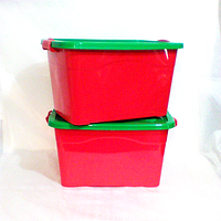 Two red rectangular plastic 6 quart buckets with green lids stacked, showing overall size and appearance.