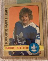 Front side of Darryl Sittler Toronto Maple Leafs hockey card, showing player image, team and player name.
