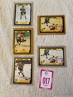 Five Bobby Orr hockey cards encased in plastic, each card showing different action shots and titles from the 1991-92 Score series