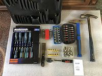 Full lot laid out including Mastercraft screwdriver set, two hammers, sockets, scraper, and tool holder.