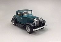 Front and side view of 1932 Ford 3-Window Coupe metallic teal diecast model car. Shows details on front grill, headlights, bumper, tires, and overall paint finish.