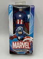 Photo of Captain America Marvel action figure in original packaging showing the figure and box condition.