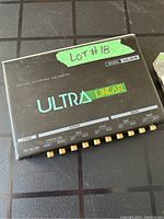 Top view of Ultra Linear ULQ4 active dividing network showing multiple RCA connectors and logo.