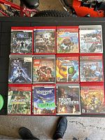 12 PlayStation 3 games arranged in two rows including various action and adventure titles with visible cover art.