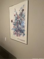 Full view of the framed Tiffany Kerr Summer Bouquet print hung on a wall, showing size and proportions.