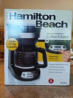 Front view of the Hamilton Beach coffee maker box showing the large 14 cup capacity and programmable features.