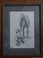 Full view of the framed print showing a young girl with a horse
