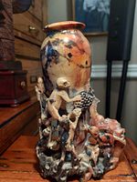 Side view showing monkeys climbing the vase with detailed nodes and textures