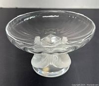Angled front view showing clear bowl and frosted bird motif pedestal