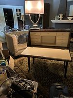 Front view of secretary desk showing exterior and interior drawers