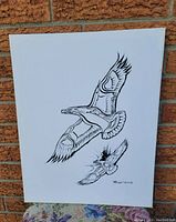 Photo of original acrylic painting showing stylized flying birds with signature and year