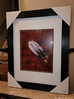 Full framed art print with protective corner guards. Shows the entire piece including matte and frame.