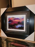 Framed fine art print showing full view with protective corner covers.