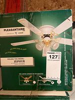 Photo of the Pleasantaire Zephyr ceiling fan box showing fan model, specifications, and fan image.